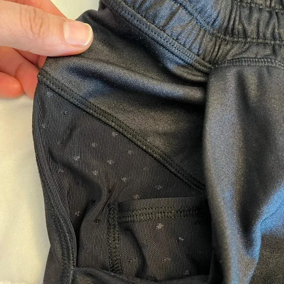 Lululemon black joggers with drawstring elastic waist band, and hemline.  Size 4 - Picture 6 of 13